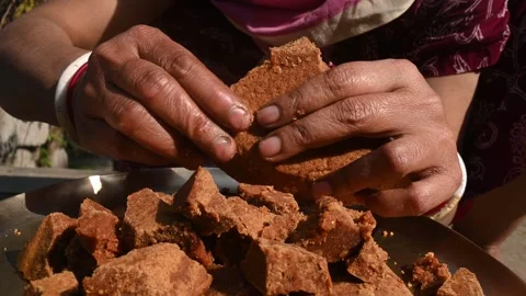 Solid Cubes of Natural Date Palm Jaggery - Nalen Gur Stock Footage 302639915