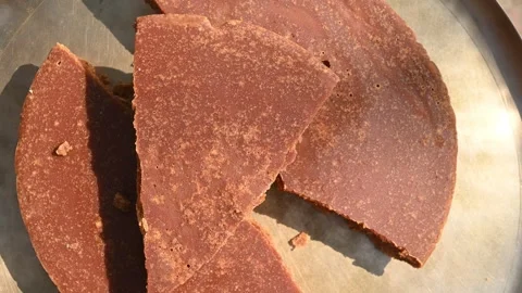 Solid Cubes of Natural Date Palm Jaggery - Nalen Gur Stock Footage 302639959