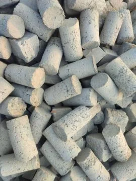 Solid Cylinder Concrete Blocks for building materials. Stock Photos