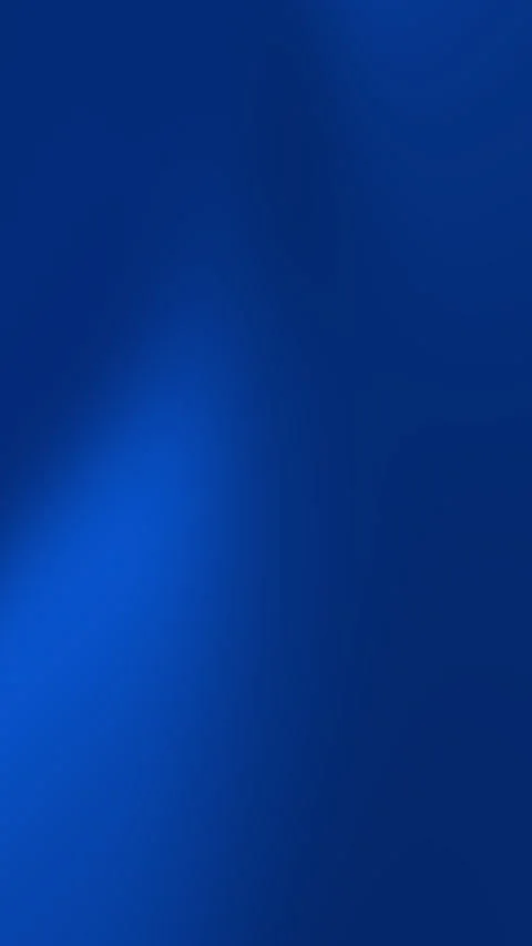 Solid with a dark blue a perfect backdrop for your vertical designs. Stockbeeldmateriaal 306103288