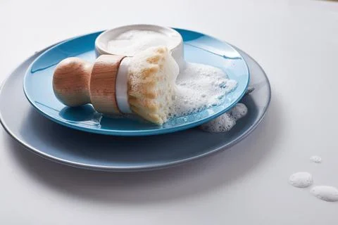 Solid dish washing soap, covered with foam. Zero waste lifestyle. Dishwashing Stock Photos