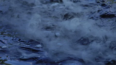 SOLID DRY ICE DANCING WITH WATER Stock Footage 91996206