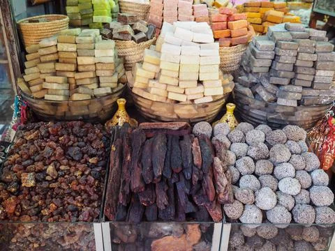 Solid fragrances and handmade perfumed soaps on display at street market Stock Photos