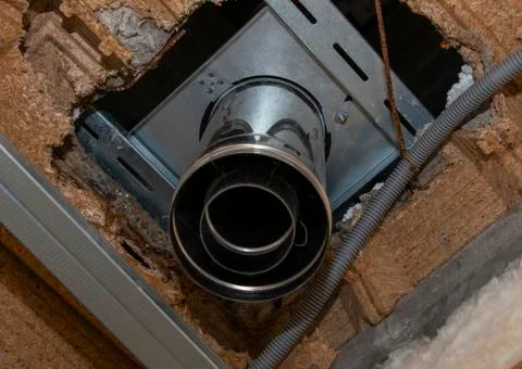 Solid fuel boiler pipe for fixing the house on the ground floor Stock Photos