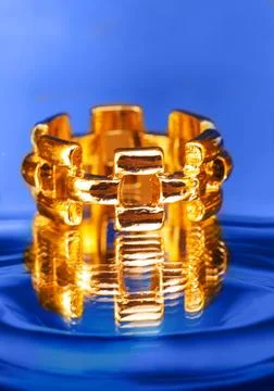 Solid gold ring with a bold geometric link deseign Stock Photos