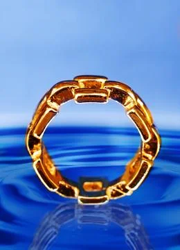 Solid gold ring with a bold geometric link design Stock Photos
