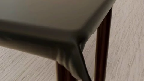 Solid Grey Cloth Draping onto Wooden Table Video Stock Footage 337636918