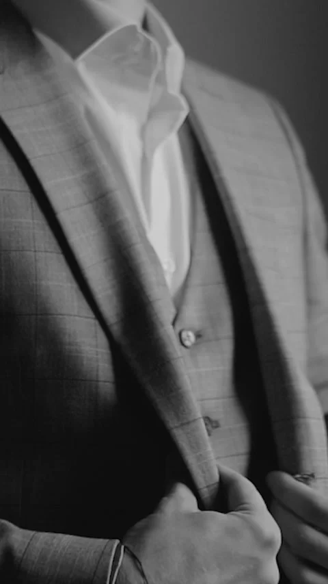 Solid handsome man groom in a business suit in the morning before his wedding Stock Footage 300961311