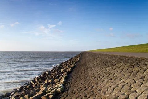 Solid, heavy dike in the Netherlands Stock Photos
