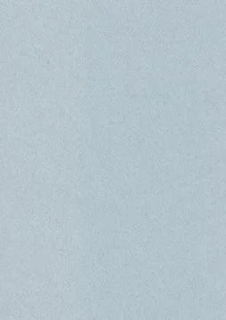 Solid light blue paper texture with a fine grain. Minimalist pastel background Foto stock