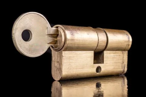 A solid lock and key for a household door. Accessory anti-burglary accessorie Stock Photos