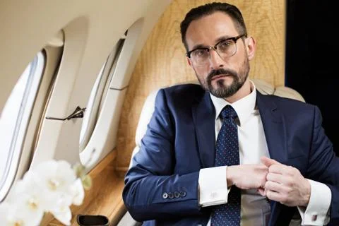 Solid man making business trip Fotos de archivo