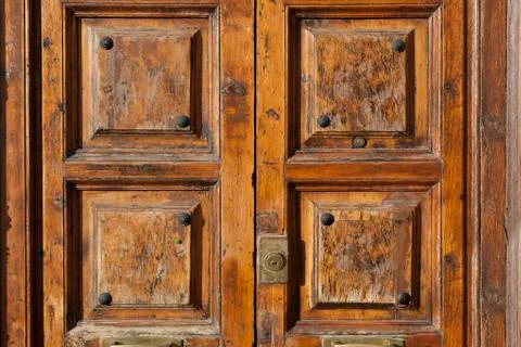 Solid massive wooden front door with vintage look Stock Photos