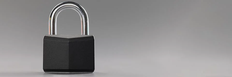 Solid metal locked padlock, thing to protect home or apartment with, protection Stock Photos
