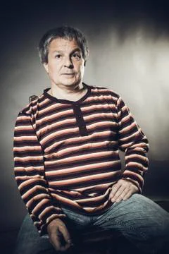 Solid middle aged man studio portrait on grey background. Foto stock