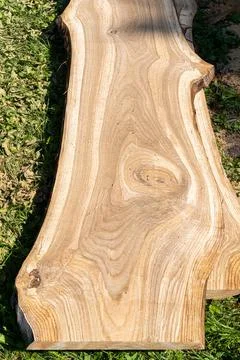 Solid oak beam from which wide boards will be cut. Stock Photos
