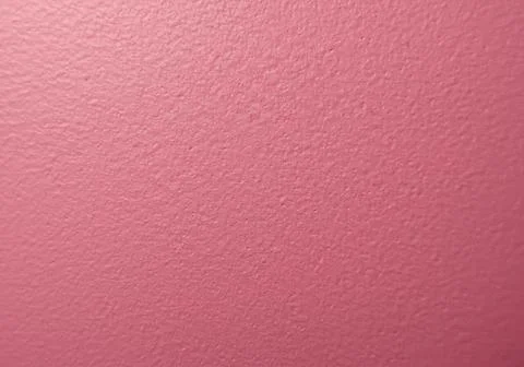 Solid pink matte texture background with subtle grainy surface pattern detail Stock Photos
