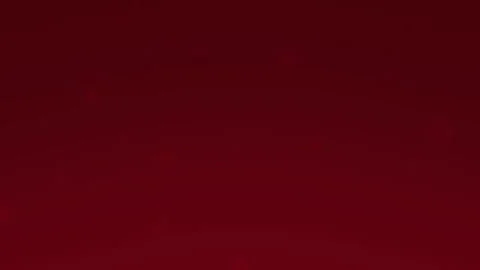 Solid red background with some white specks Stock Footage 310921793