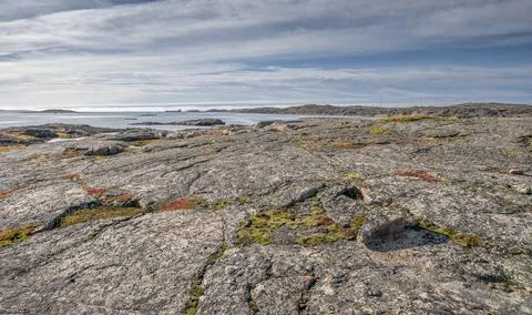 Solid Rock on the Shore of the Arctic Ocean Stock Photos