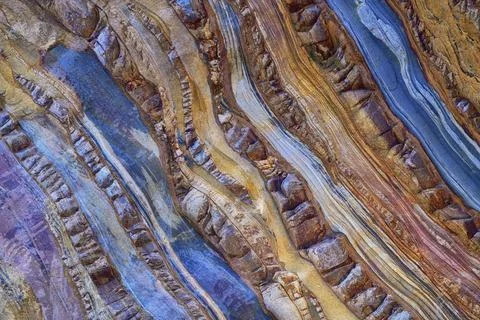 Solid rocky formation with abstract pattern Stock Photos