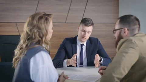 A solid sales manager of a large financial company concludes an agreement with a Stock Footage 194415233