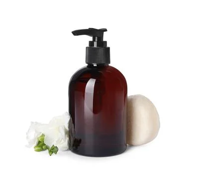 Solid shampoo bar and bottle of cosmetic product on white background Stockfoto's