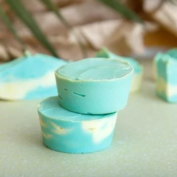 Solid shampoo bar many blue mint natural handmade soap bars in Tower stack shape Stock Photos