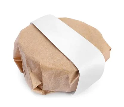 Solid shampoo bar wrapped in parchment isolated on white 스톡 사진