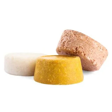 Solid shampoo bars on white background. Hair care Foto stock