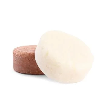 Solid shampoo bars on white background. Hair care 写真素材