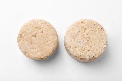 Solid shampoo bars on white background, flat lay 写真素材