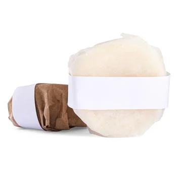 Solid shampoo bars wrapped in parchment on white background 스톡 사진