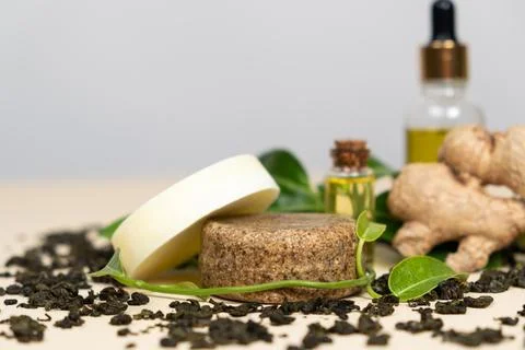 Solid shampoos made from ginger, green tea and oils. Natural cosmetics for ha Stock Photos
