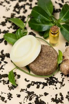 Solid shampoos made from ginger, green tea and oils. Natural cosmetics for hair Stock Photos