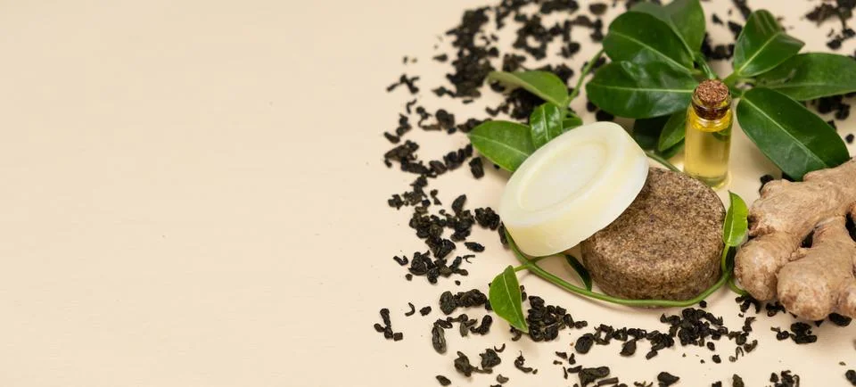 Solid shampoos made from ginger, green tea and oils. Natural cosmetics for hair Stock Photos