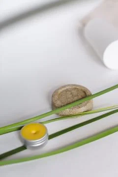 Solid soap or scrub and eco yellow balm in jar on white background. Stock Photos