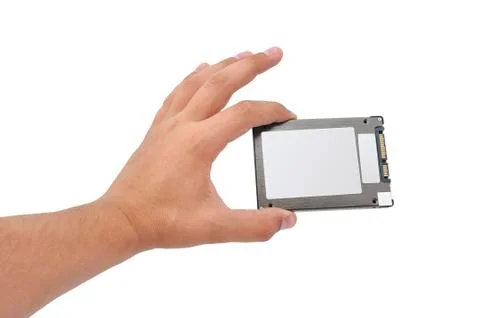 Solid-state disk in hand Stock Photos