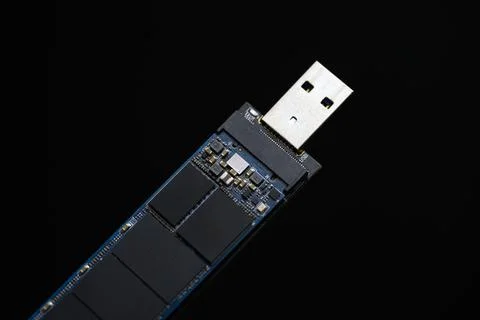 Solid state drive against dark isolated background Stock Photos