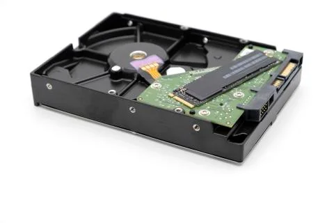 Solid state drive, new generation of storage drive on antique hard disk drive Stock Photos