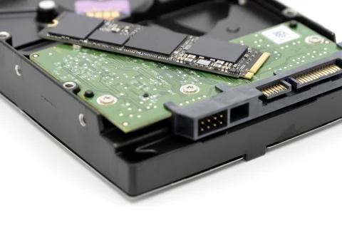 Solid state drive, new generation of storage drive with antique hard disk drive Stock Photos