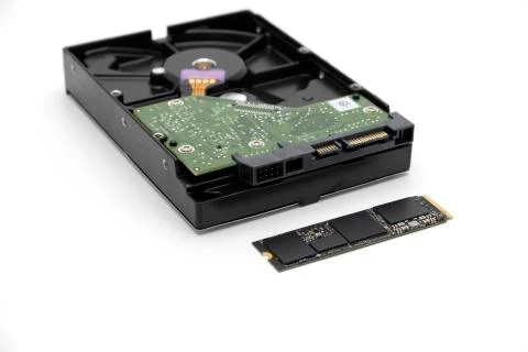 Solid state drive, new generation of storage drive with antique hard disk drive Stock Photos