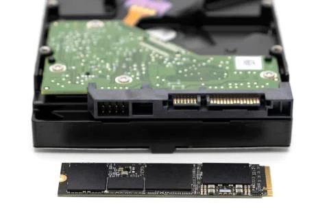 Solid state drive, new generation of storage drive with antique hard disk drive Stock Photos