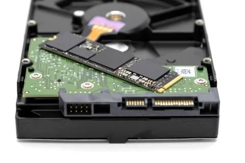 Solid state drive, new generation of storage drive on antique hard disk drive Stock Photos