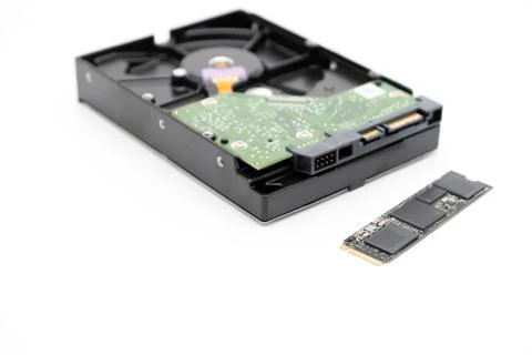 Solid state drive, new generation of storage drive with antique hard disk drive Stock Photos