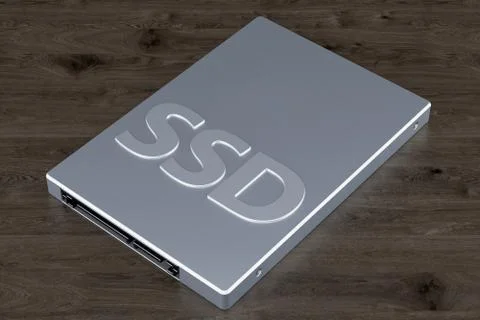 Solid state drive SSD on the wooden background, 3D rendering Illustrazione stock