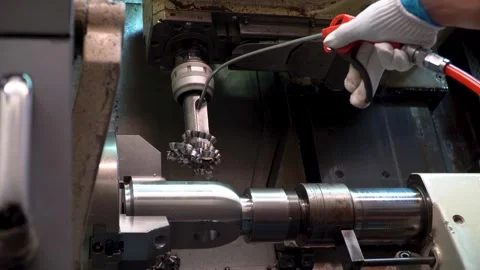Solid steel metal workpieces mounted on spindle chucks of high-precision CNC Stock Footage 240166952