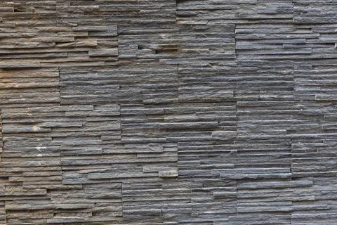 Solid stone pattern of dark slate, background ribbed horizontal stripes Stockfoto's