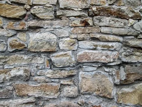Solid stone structure, light ocher color. Texture with cave stone. Foto stock