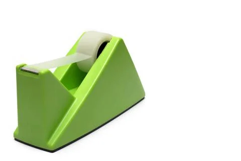 Solid tape dispenser plastic strip white background Oblique close up of la... Stock Photos