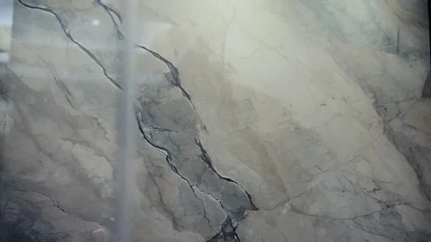 Solid wall crafted of natural stone with unique pattern used in design of luxury Stock Footage 263674599